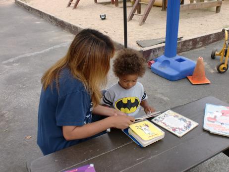 teacher reading with child