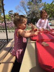 Play with blocks outdoors