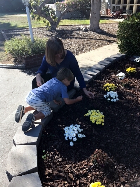 Heike and grandson in front of preeschool