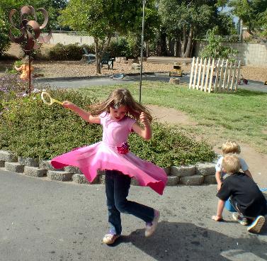 girl dancing large yard day care